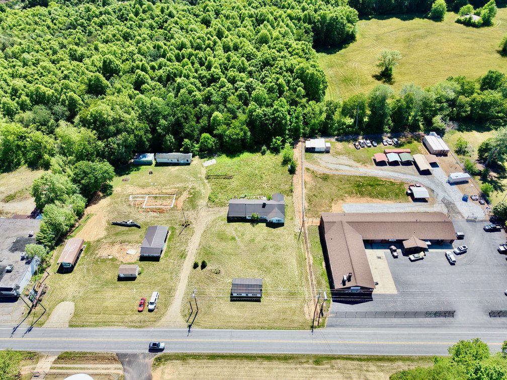 JUDICIAL AUCTION - .91 +/- Acres, Home and Office with NC Hwy. 16 Frontage in Taylorsville, NC