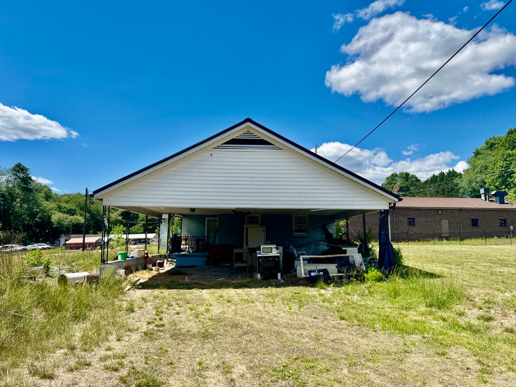 JUDICIAL AUCTION - .91 +/- Acres, Home and Office with NC Hwy. 16 Frontage in Taylorsville, NC