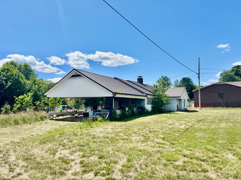 JUDICIAL AUCTION - .91 +/- Acres, Home and Office with NC Hwy. 16 Frontage in Taylorsville, NC
