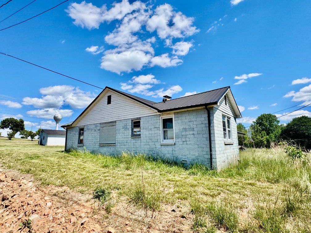 JUDICIAL AUCTION - .91 +/- Acres, Home and Office with NC Hwy. 16 Frontage in Taylorsville, NC