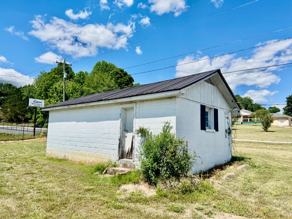 JUDICIAL AUCTION - .91 +/- Acres, Home and Office with NC Hwy. 16 Frontage in Taylorsville, NC