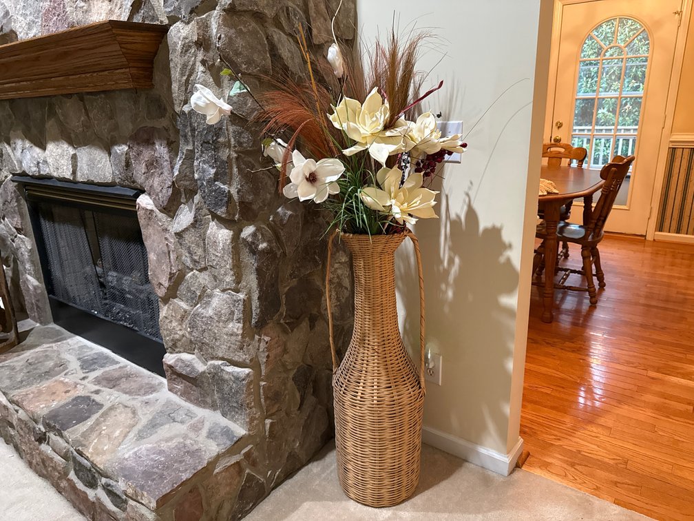Woven Wicker Floor Vase with Faux Magnolia Arrangement