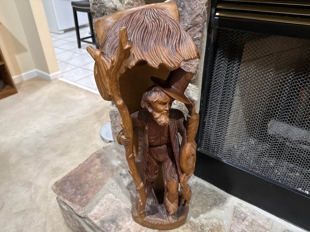 Hand-Carved Wooden Sculpture of a Man