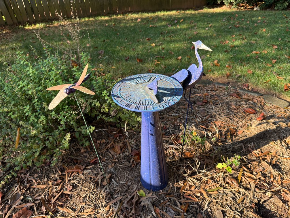 Garden Sundial and Decorative Metal Stakes