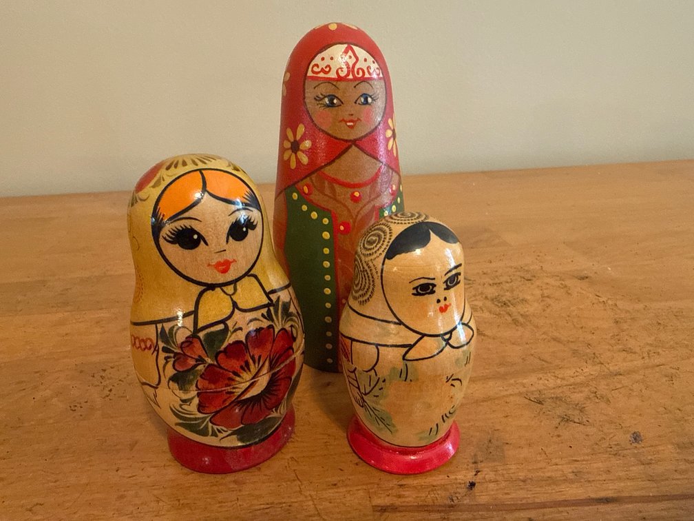 Matryoshka Nesting Dolls and Wicker Basket