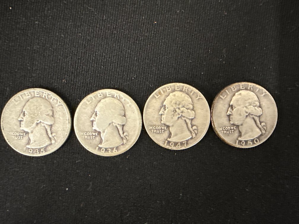 Four Washington Quarter Dollars