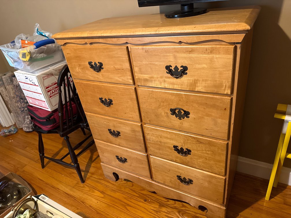 Light Wood Eight-Drawer Dresser with Batwing Pulls