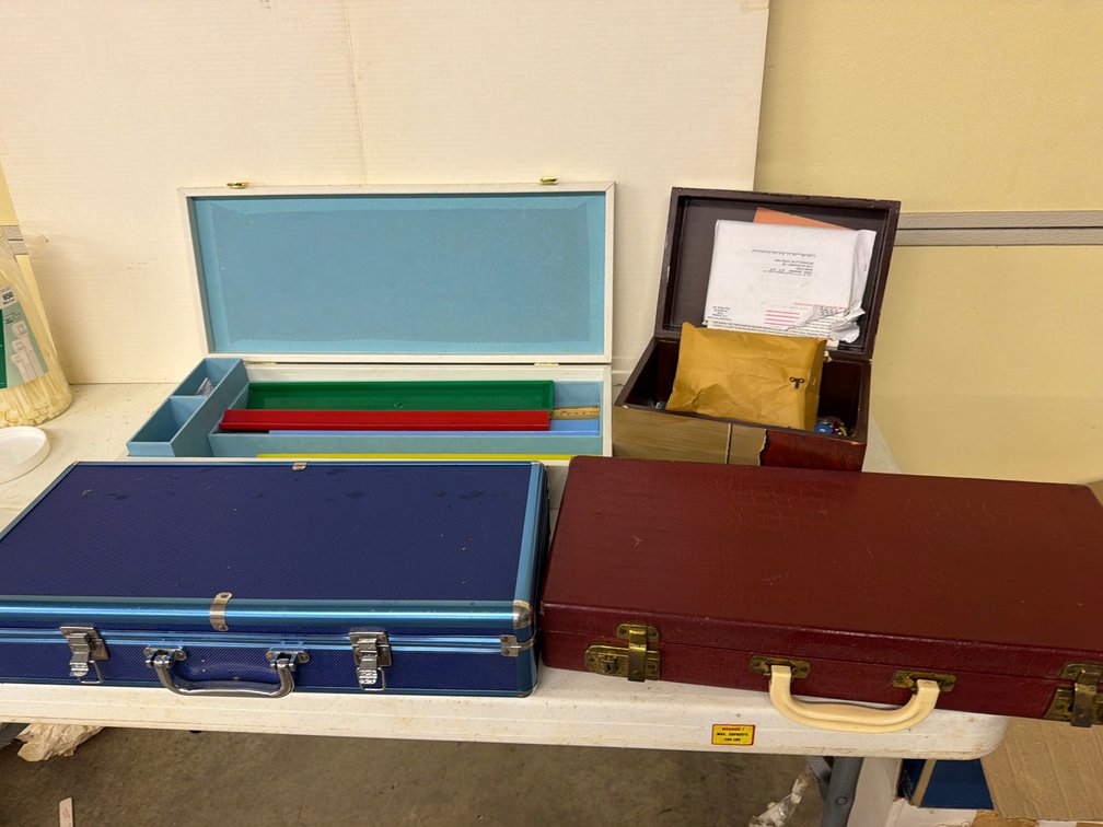 Four Mahjong Cases with Tile Racks and Gaming Accessories