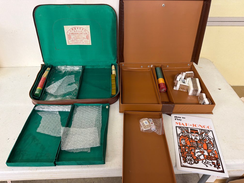 Two Mahjong Pieces of the Game in Vinyl Carrying Cases