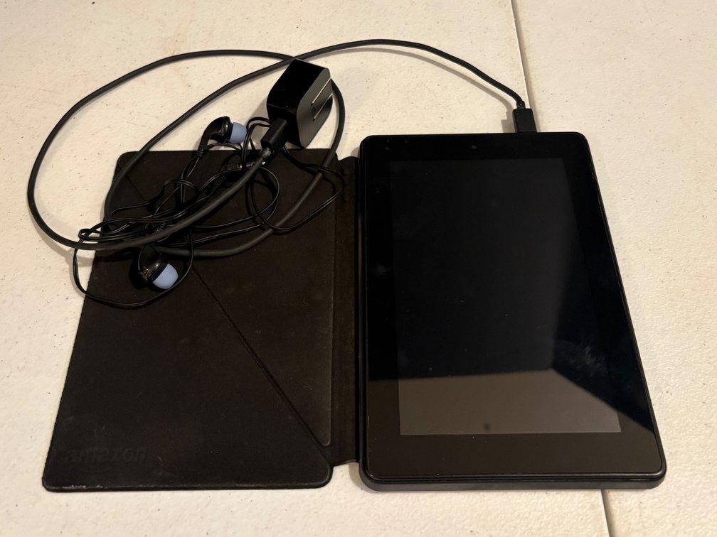 Amazon Tablet with Folio Case, Charger, and Earbuds
