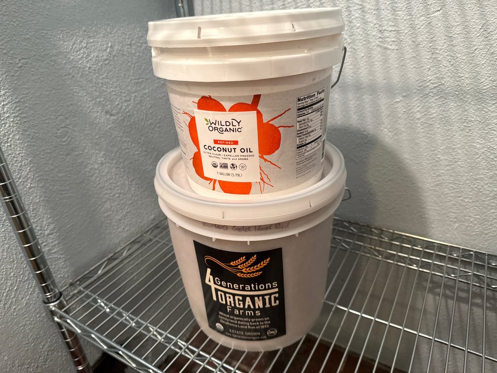 Organic Coconut Oil and Wheat Berries in Storage Buckets