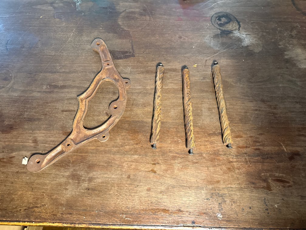 Cast Iron Bracket and Twisted Iron Rods