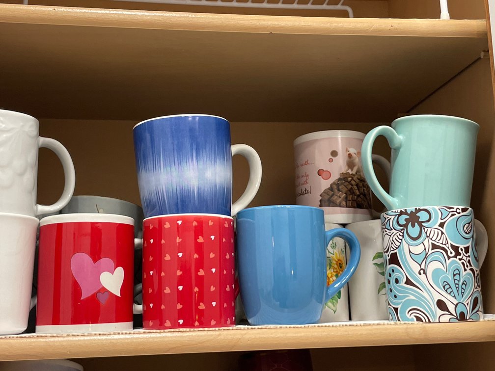 Glazed Ceramic Coffee Mugs with Graphic and Floral Motifs