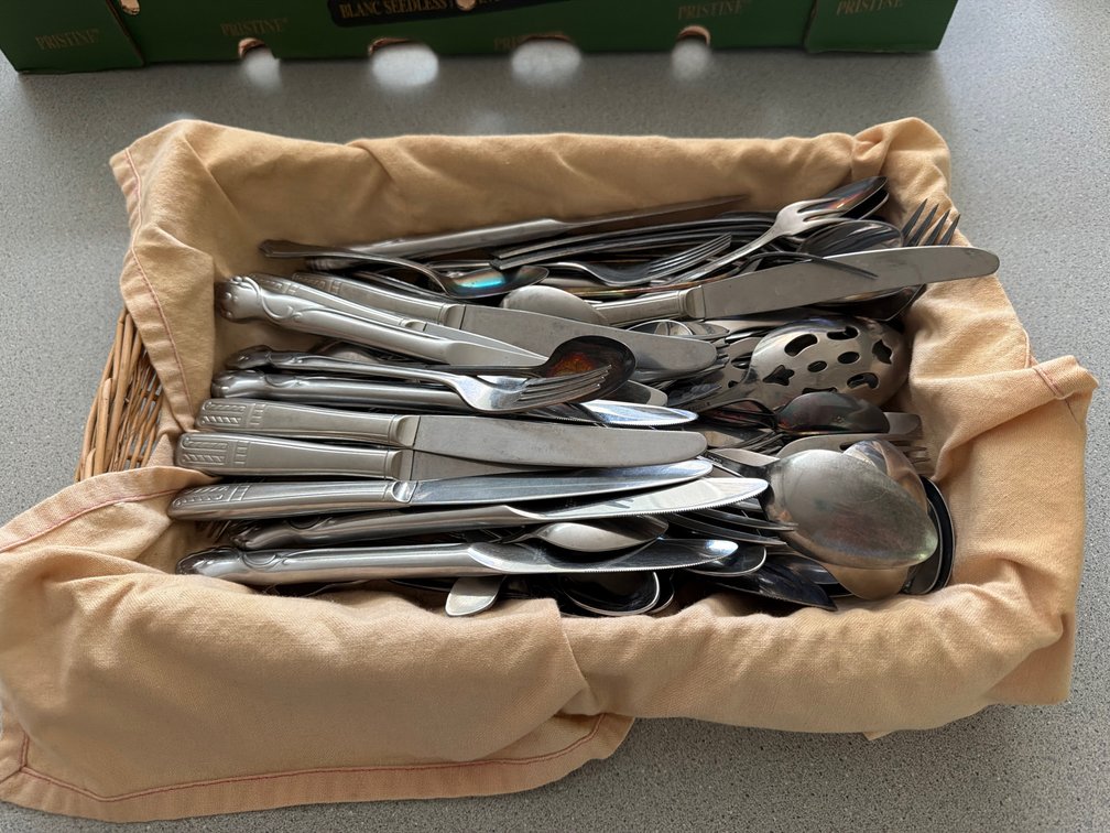 Assorted Stainless Steel Flatware Lot with Wicker Basket