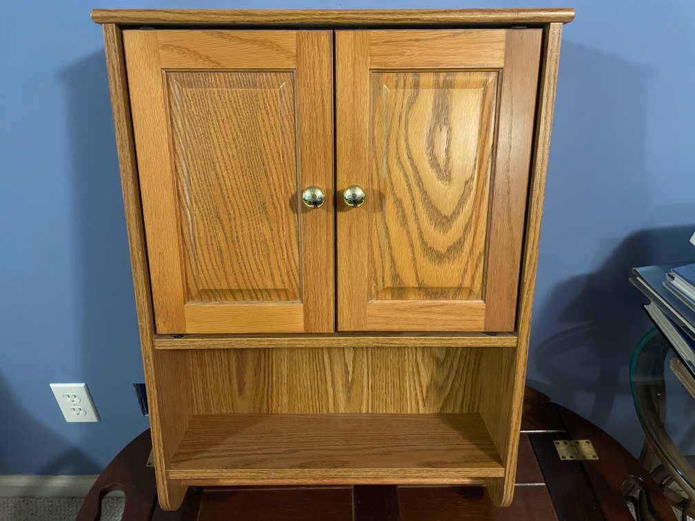 Oak Finish Two-Door Wall Cabinet with Towel Rod