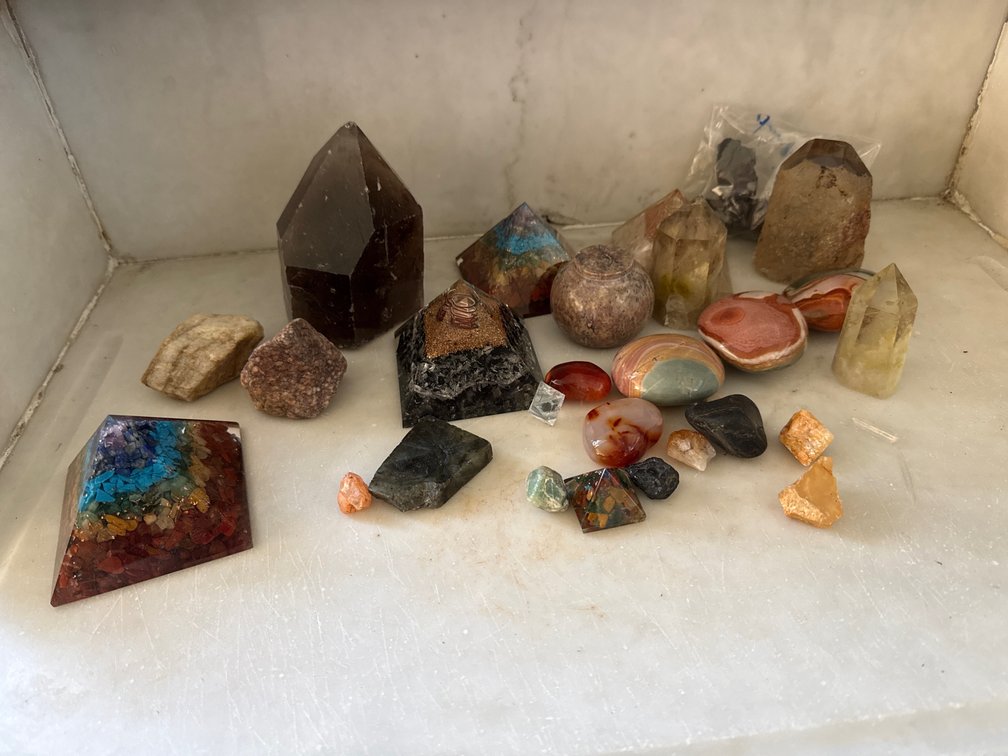 Crystal Points, Orgonite Pyramids, and Mineral Specimens