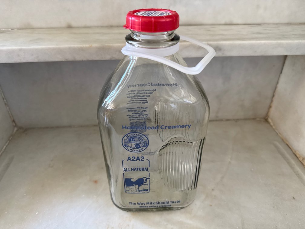 Homestead Creamery Glass Milk Bottle with Red Cap