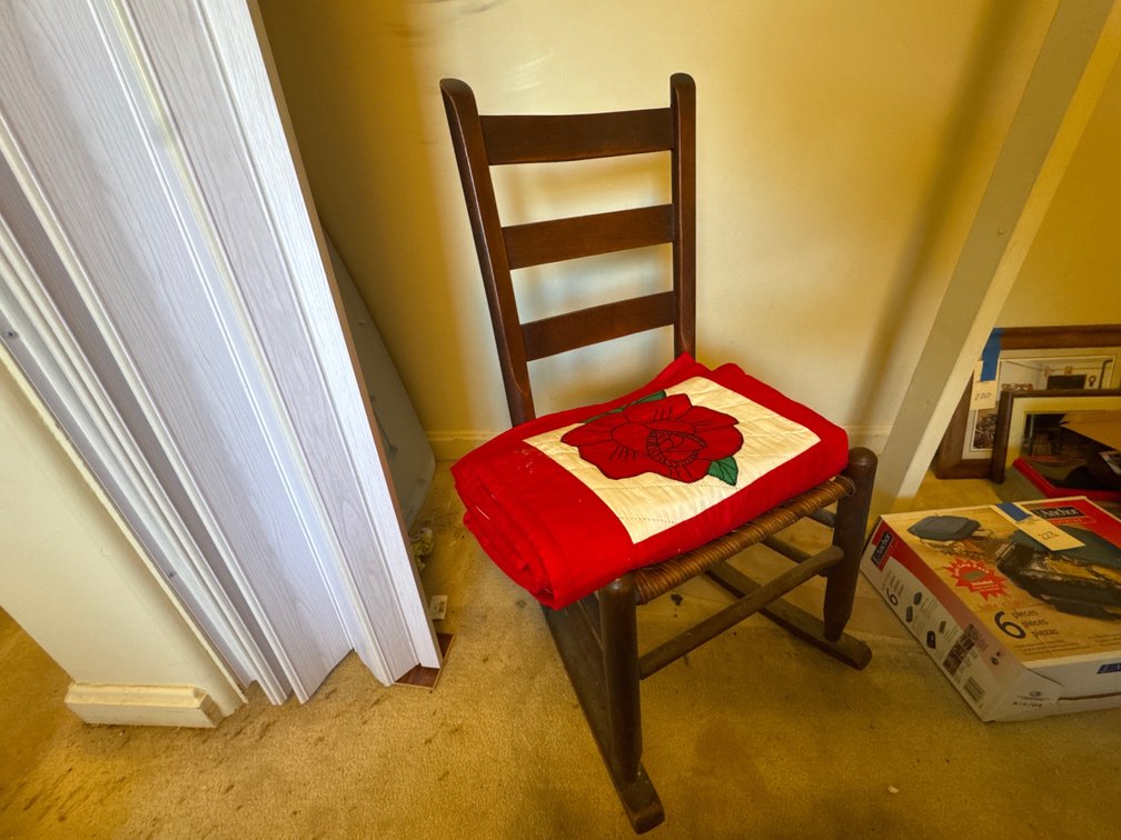 Wooden Ladderback Rocking Chair and Rose Appliqué Quilt