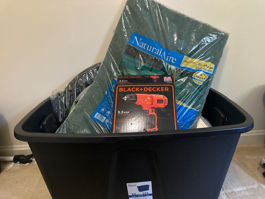 Storage Tote with Corded Drill, Pop-Up Lawn Bag, and More