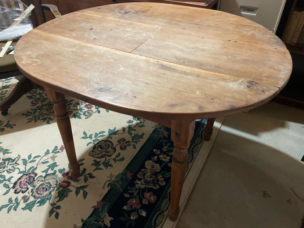 Round Wooden Plank-Top Table with Turned Legs
