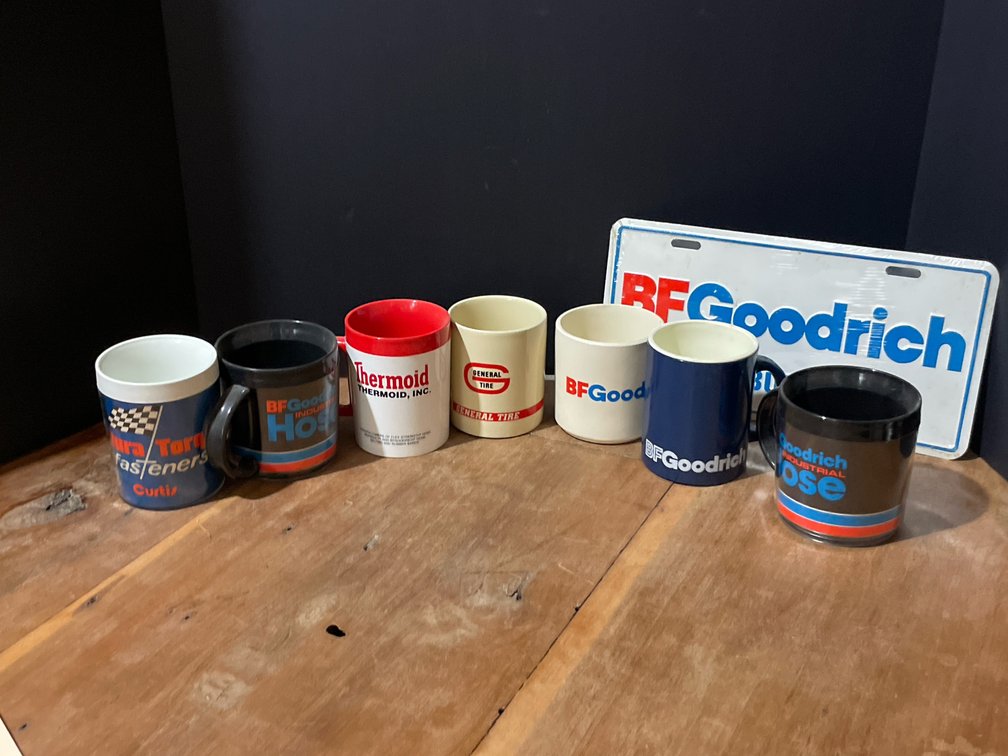 Advertising Coffee Mugs and Embossed License Plate Sign