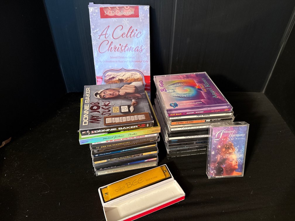 Music CDs, Cassette Tape, and Bee Harmonica
