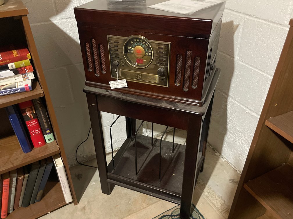 Audio Entertainment Center on Stand and Compact Discs