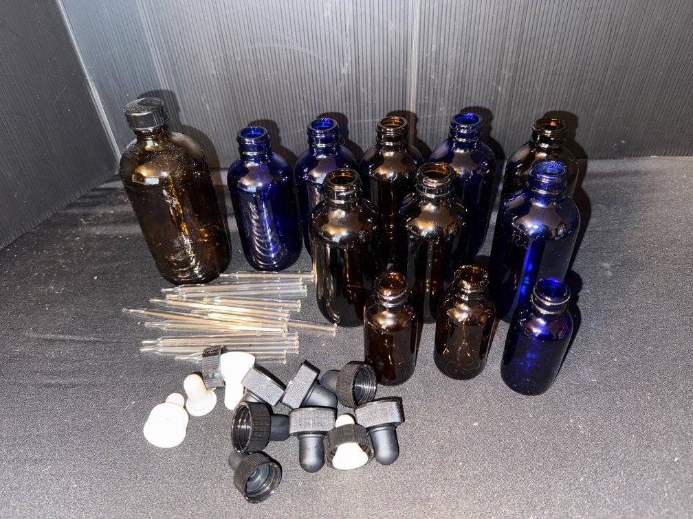 Amber and Cobalt Blue Glass Bottles with Pipettes and Caps
