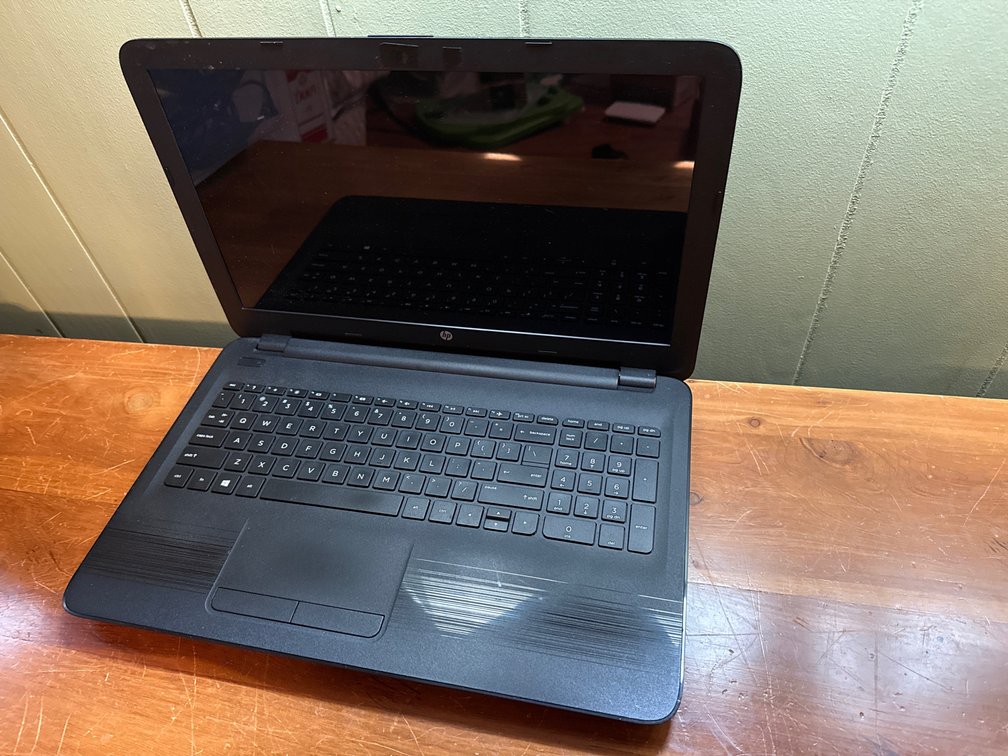 Laptop, Power Strip, AC Adapters, and Power Cords