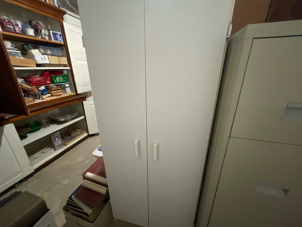 Tall White Laminate Two-Door Storage Cabinet
