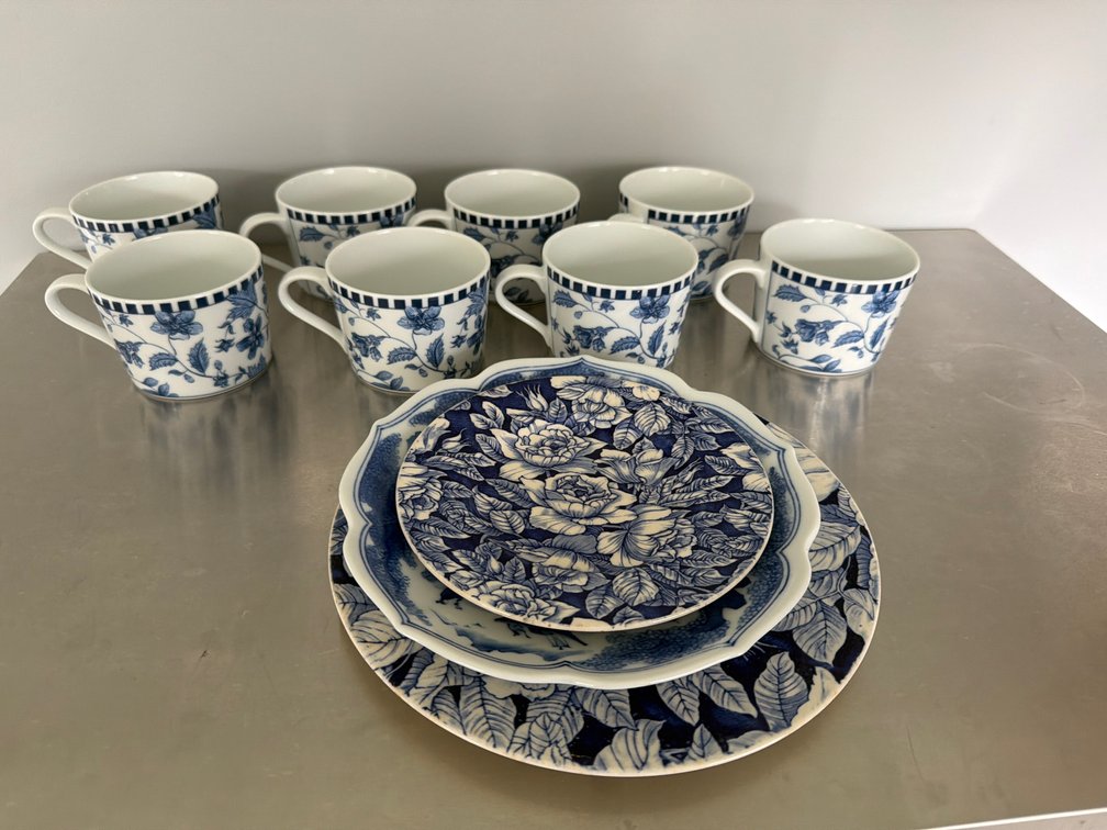 Blue and White Ceramic Mugs and Assorted Plates