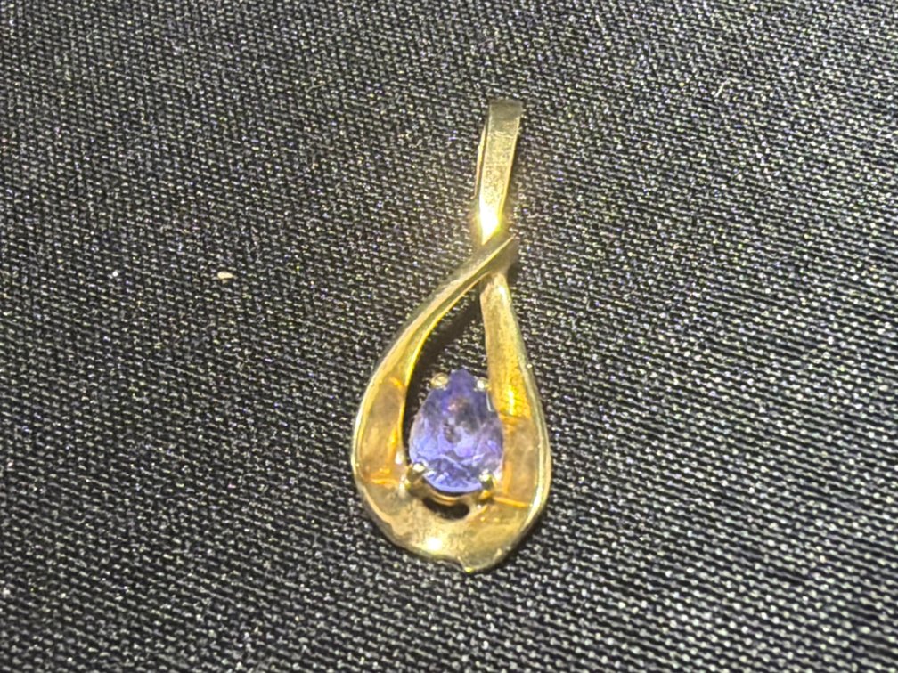 14K Yellow Gold Swirl Pendant with Purple Gemstone
