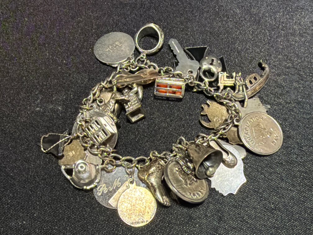 Sterling Silver Charm Bracelet with Assorted Charms