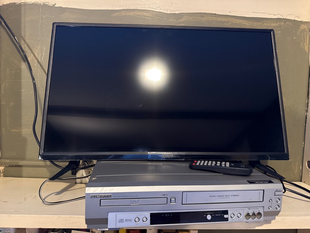 Flat-Screen Television and DVD/VCR Combo Player with Remote