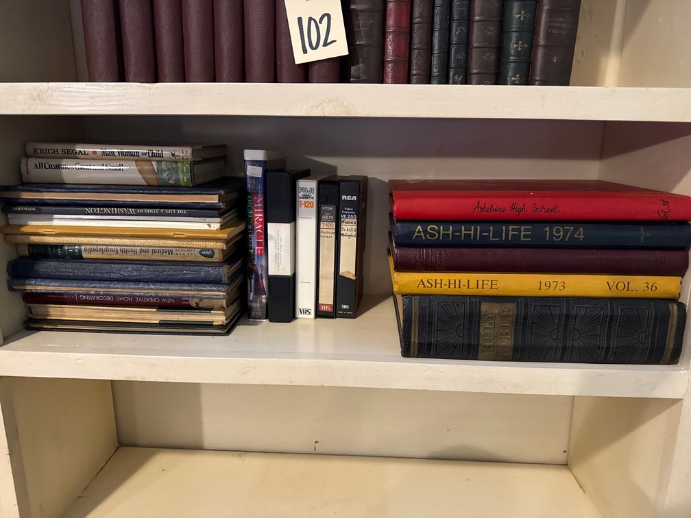 Hardcover Books, Yearbooks, Holy Bible, and VHS Tapes