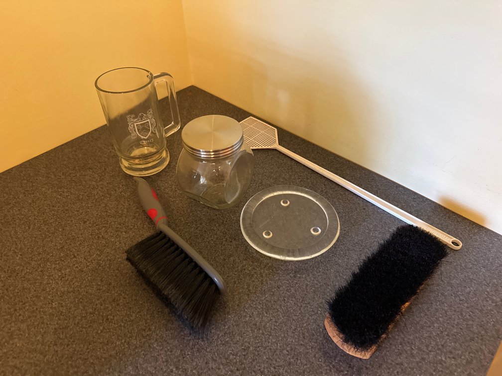 Glass Beer Mug, Storage Jar, Brushes, and Fly Swatter