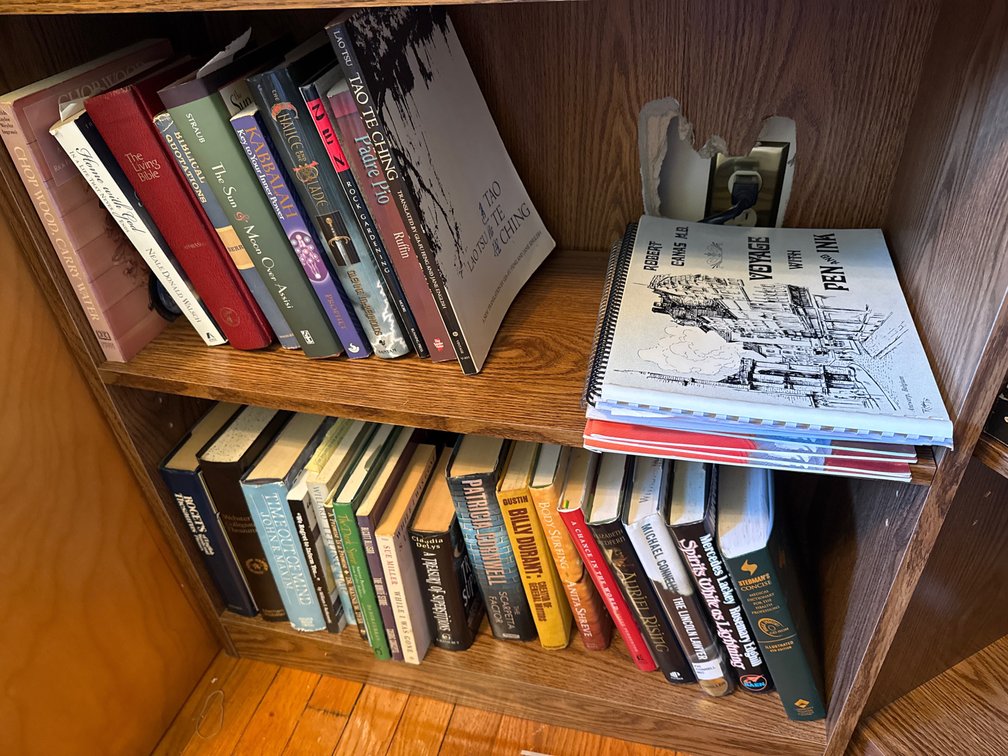 Reference, Religion, and Fiction Books with Wooden Shelves