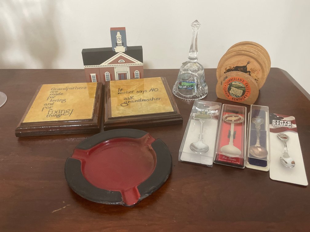 Souvenir Spoons, Glass Bell, Wooden Coasters, and Plaques