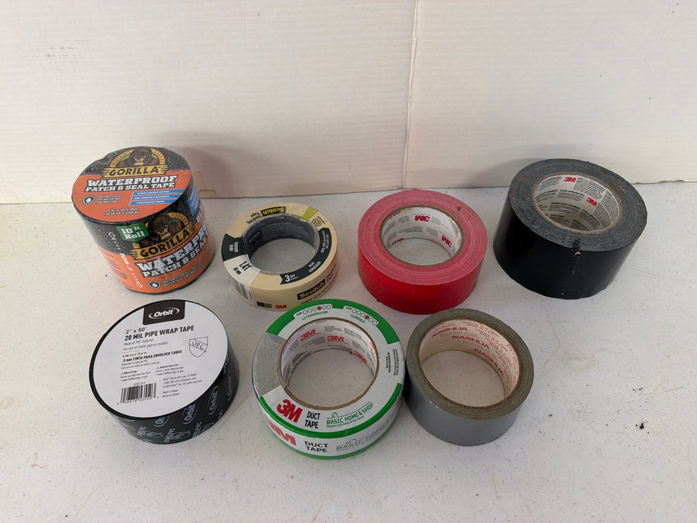 Duct Tape, Masking Tape, Pipe Wrap, and Plastic Bucket
