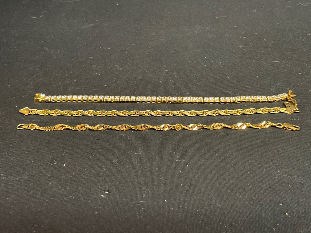 Three Gold-Tone Sterling Silver Bracelets
