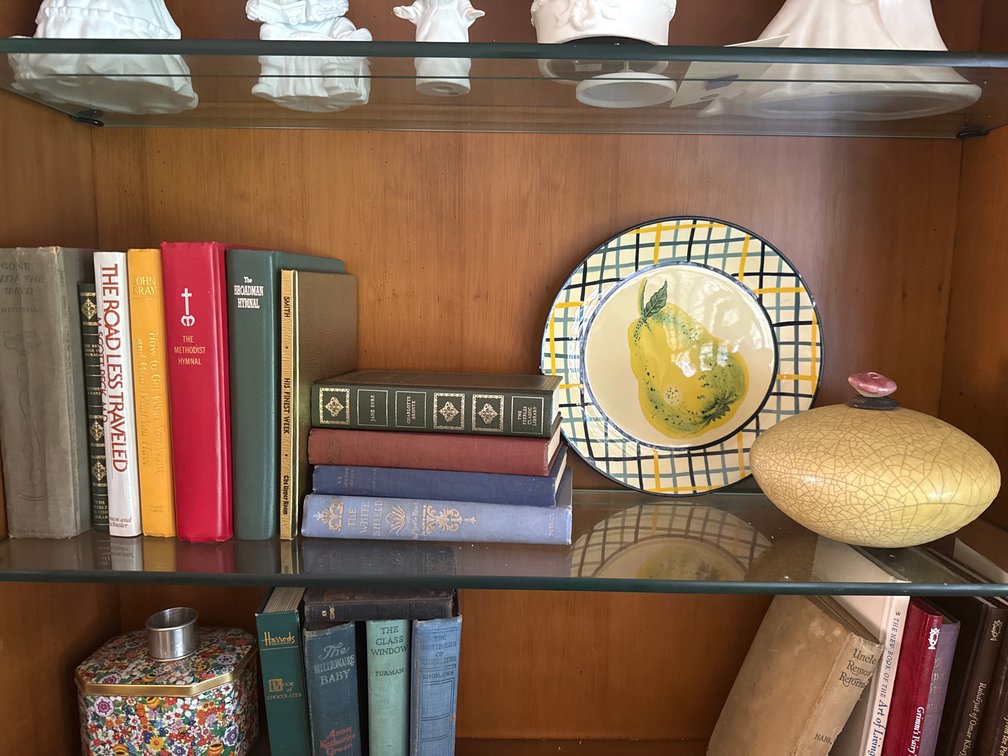Hardcover Books, Ceramic Pear Plate, and Lidded Vessel