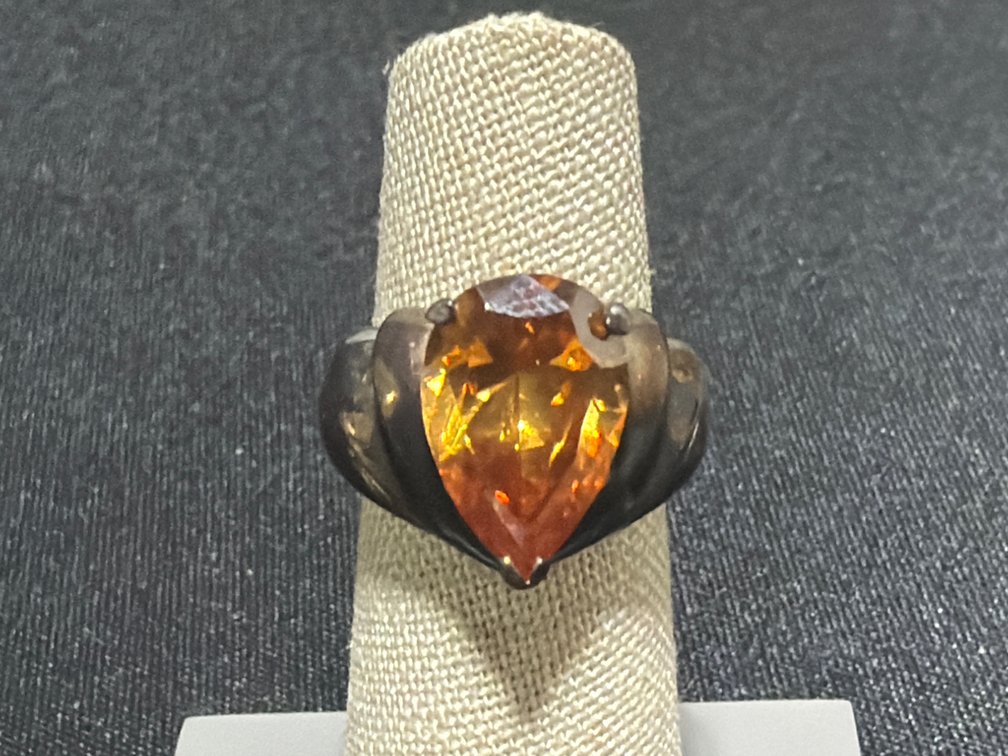 Sterling Silver Ring with Pear-Cut Amber-Colored Stone