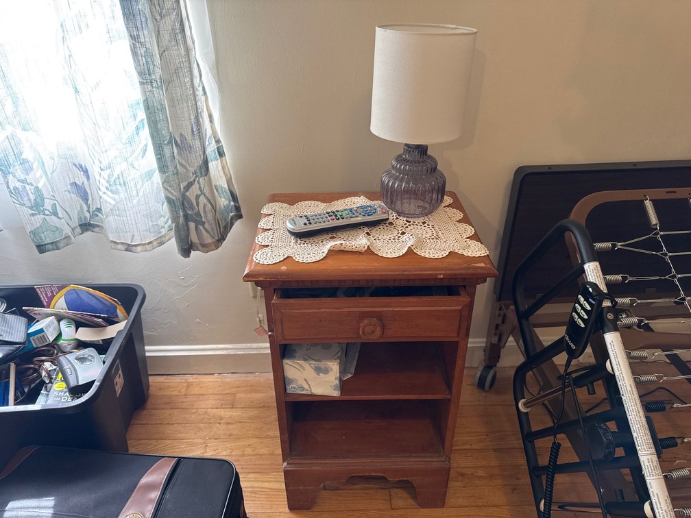 Wood Nightstand with Table Lamp and Accessories