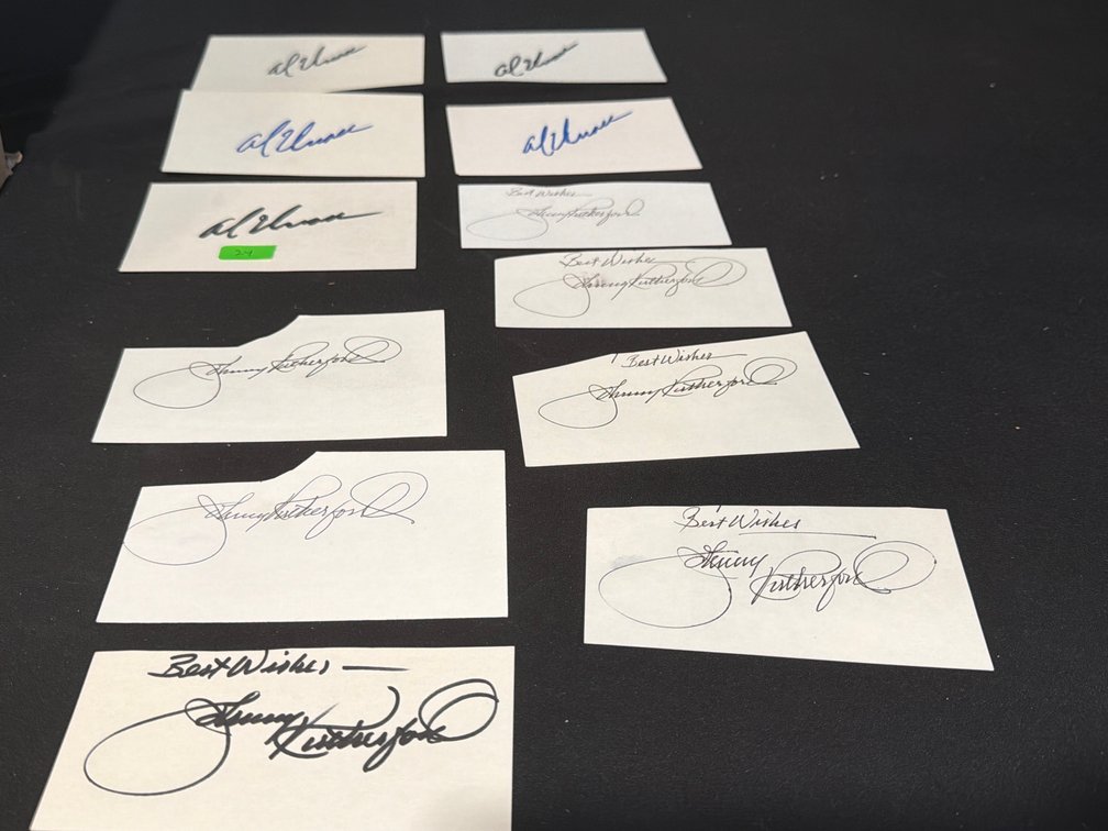 Al Unser and Johnny Rutherford Autographed Cards