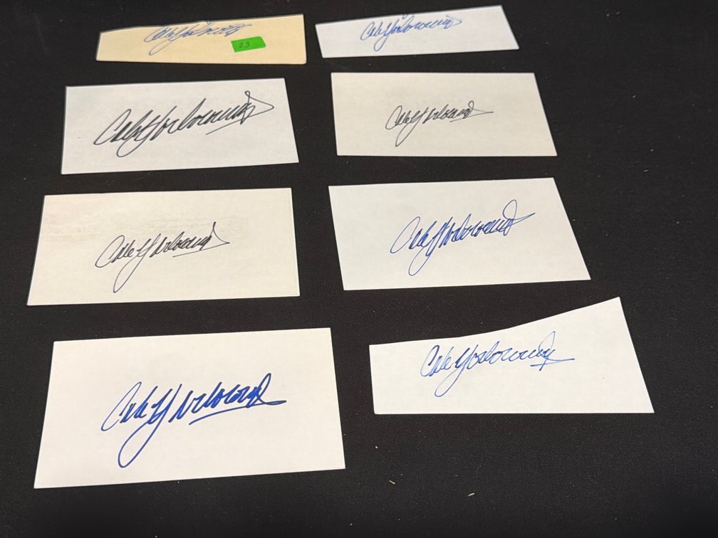 Eight Autographed Paper Slips and Index Cards
