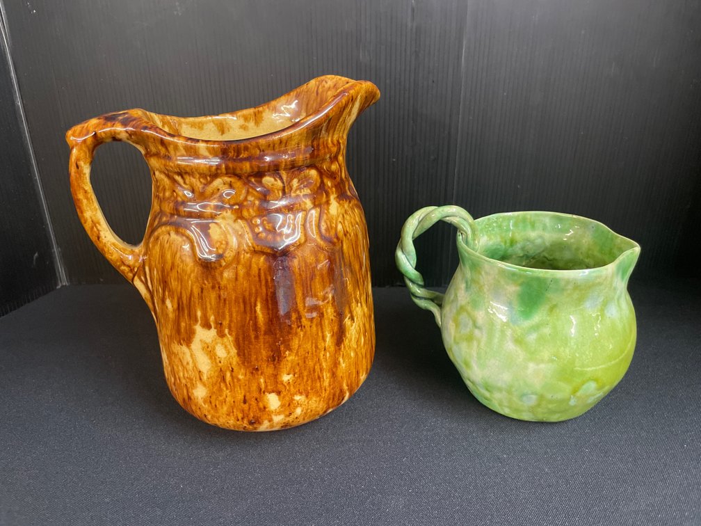 Two Mottled Glaze Ceramic Pitchers