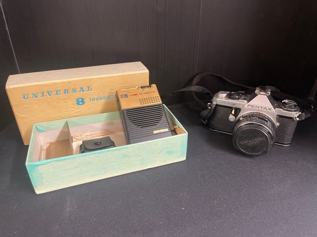 35mm SLR Camera with 50mm Lens and Transistor Radio