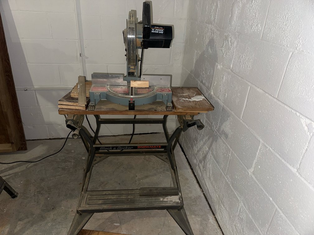 Delta 10" Power Miter Saw on Black & Decker Workmate Stand