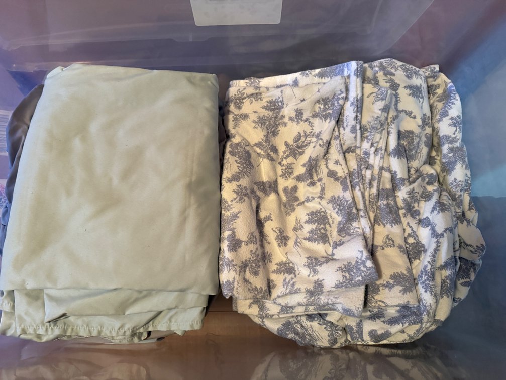 Bed Linens in Storage Tub