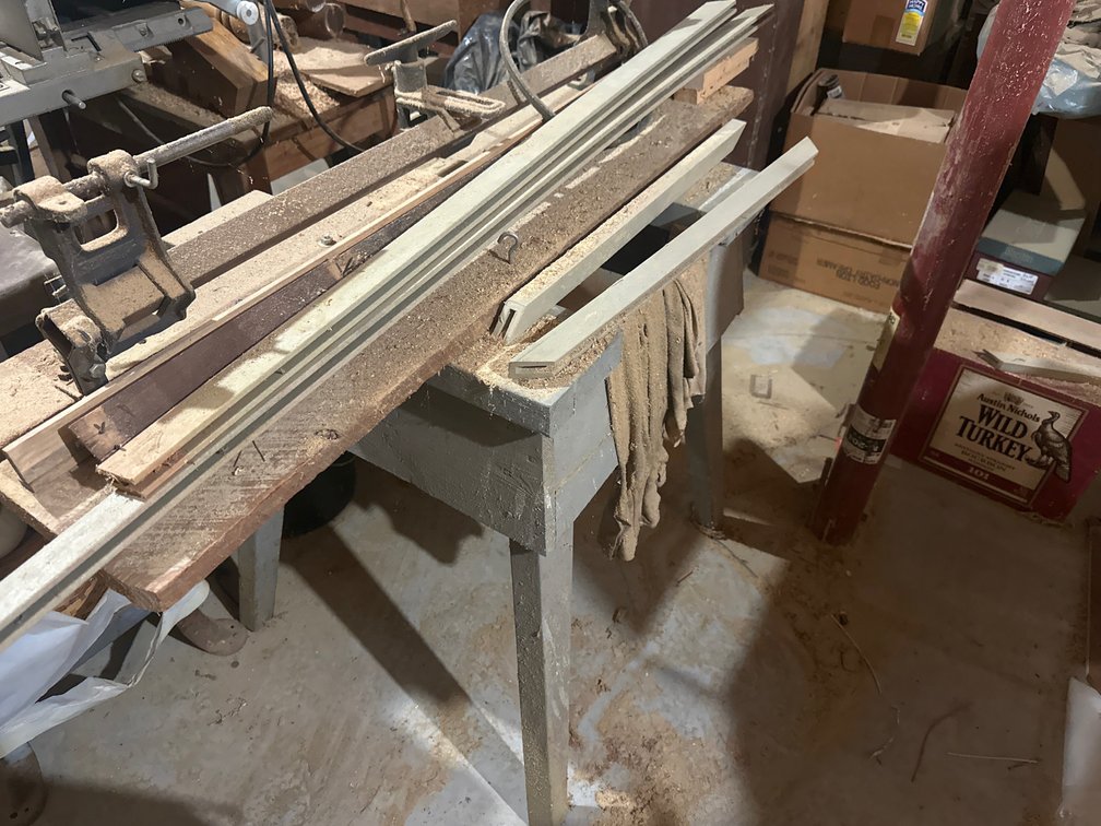 Wood Lathe on Wooden Stand, Workbench, and Moulding